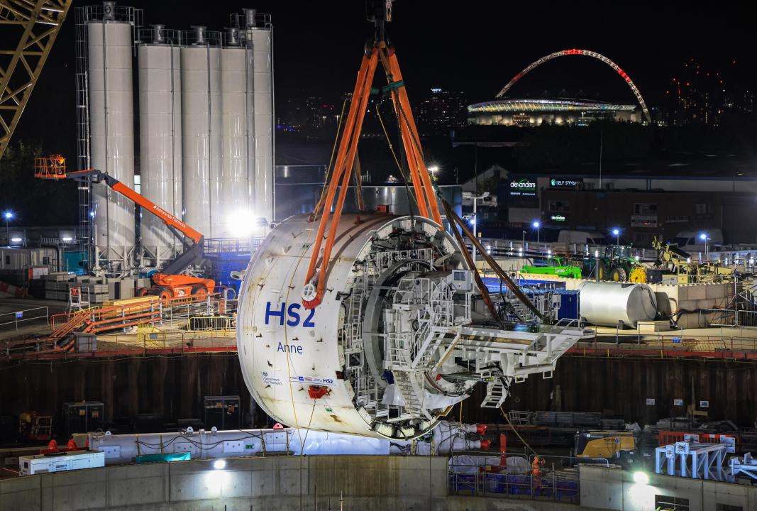 Tunnel boring machine being lowered into the ground