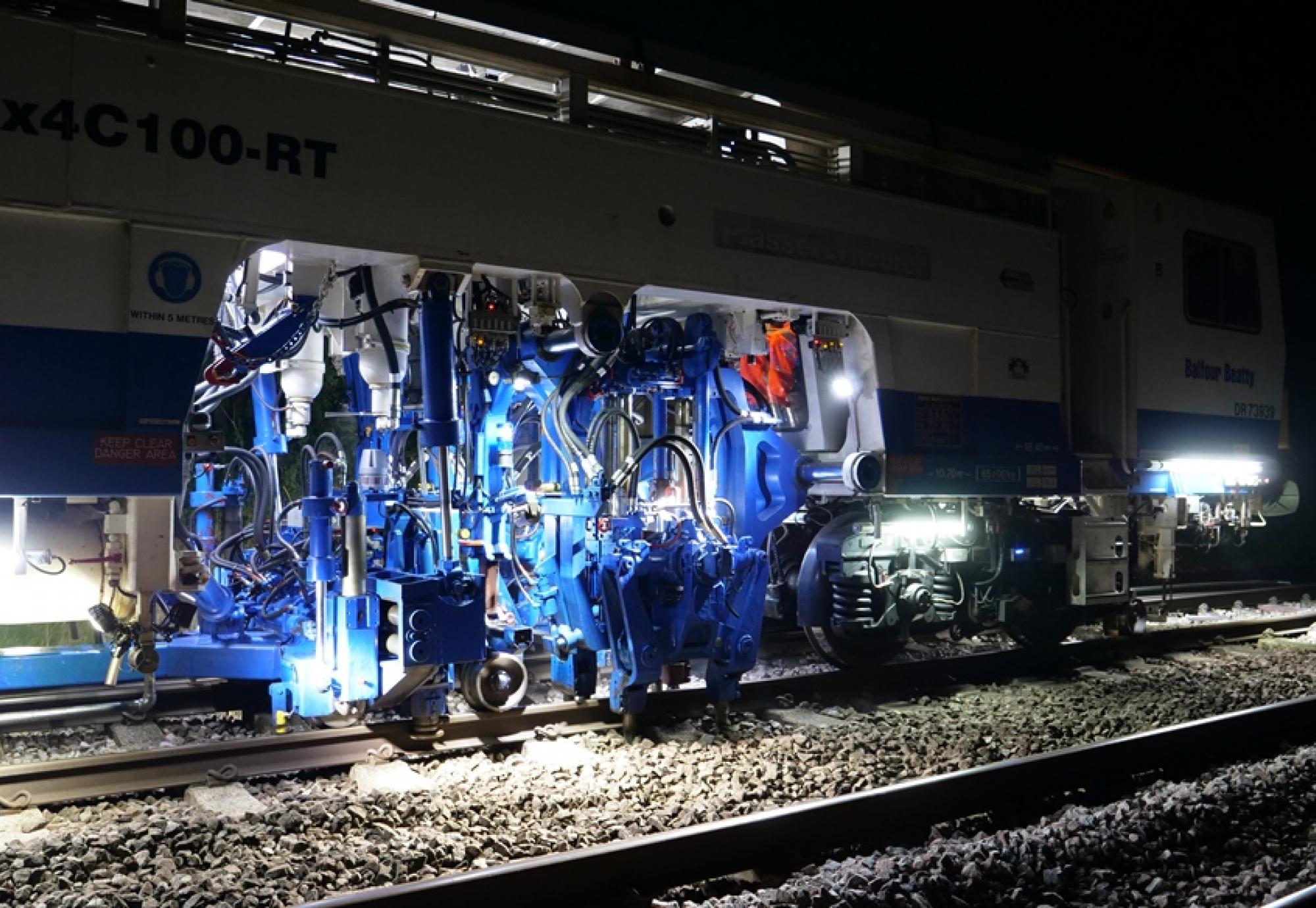 Network Rail's tamping machines in action in Kent