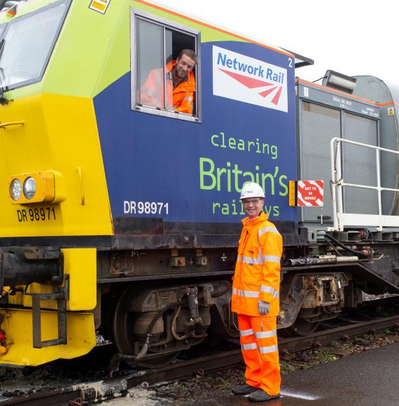 Paul Plawecki of Balfour Beatty and Rob Davis of Network Rail with a leaf-busting train