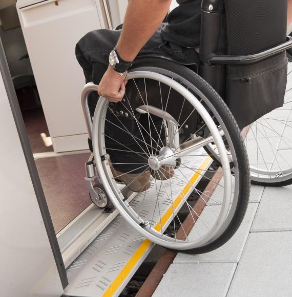 Wheelchair user boarding a train