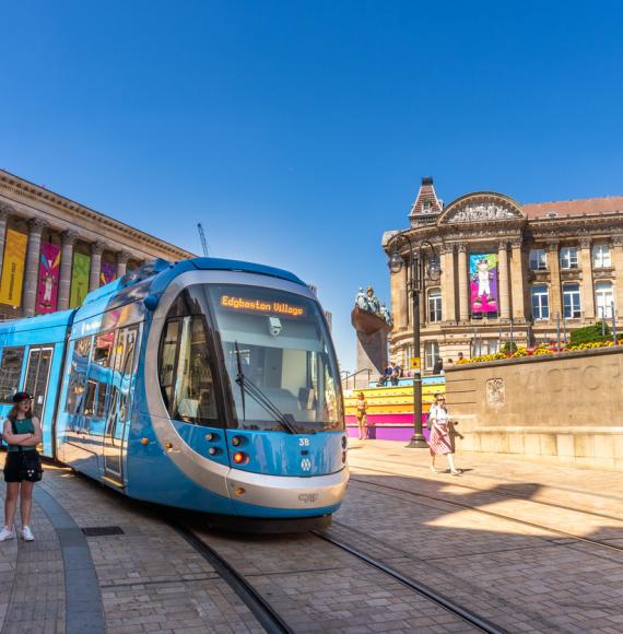 Image of Birmingham tram with City Hall in the background