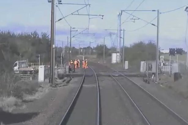 Staff scramble to safety from 125mph train in near-miss due to ‘unsafe and unofficial’ working practices