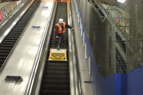 Escalator trolleys make light of heavy work