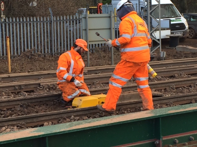Orange army engineers making repairs on the WCML north of Carlisle