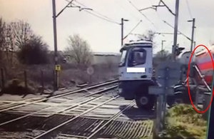 RAIB to investigate lorry’s near miss with train at level crossing