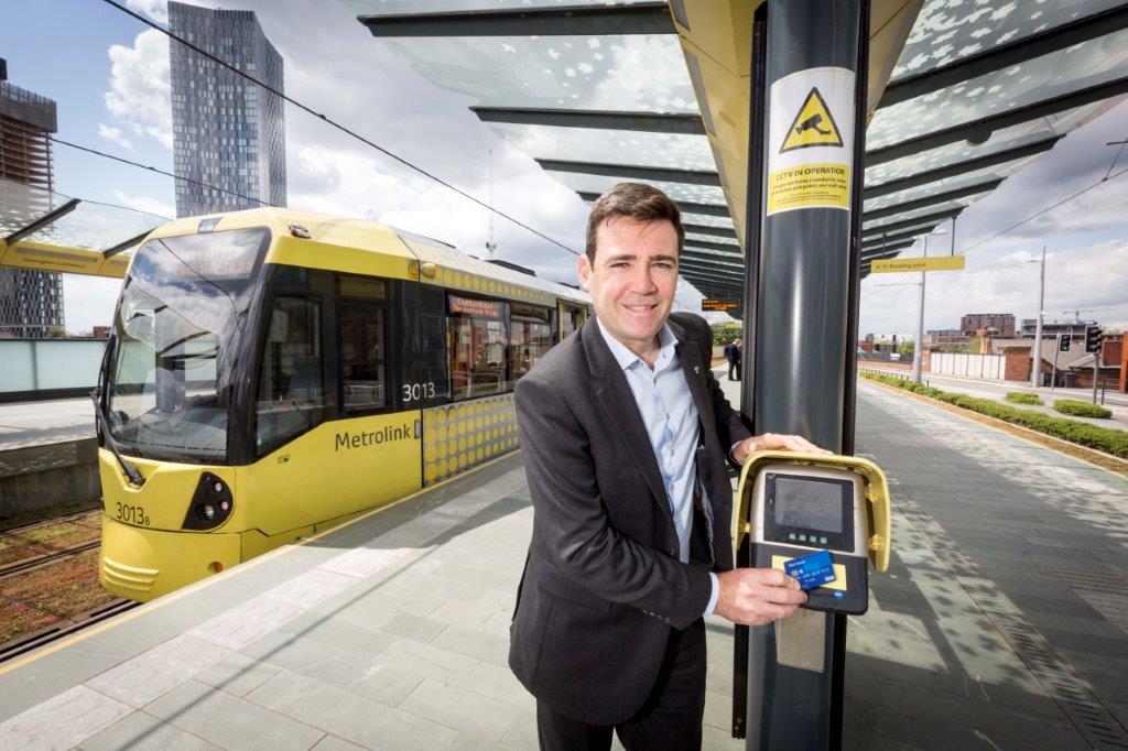 Andy Burnham touching in at a Metrolink tram stop