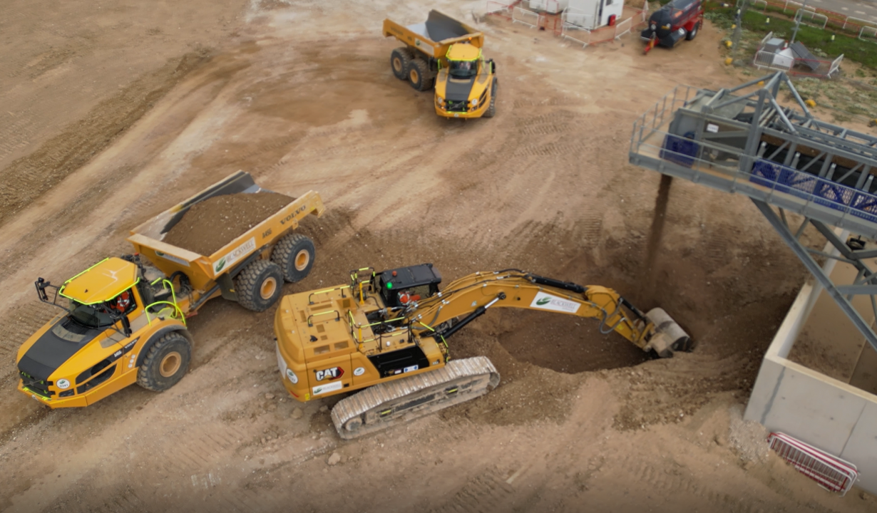 Excavators and tipper trucks at work