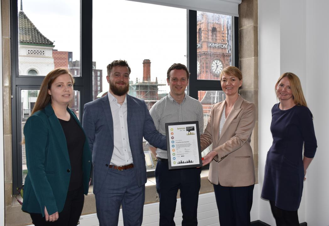 Katie Goldsmith, Hugh Thomas, Peter Walley, Fran Barrett, and Nicola Martin accepting the award, via TPE 