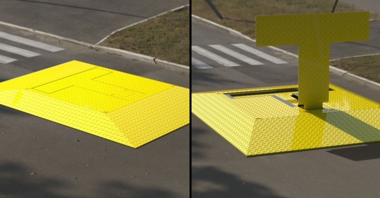 Scorpion Portable Barrier resting and active on road