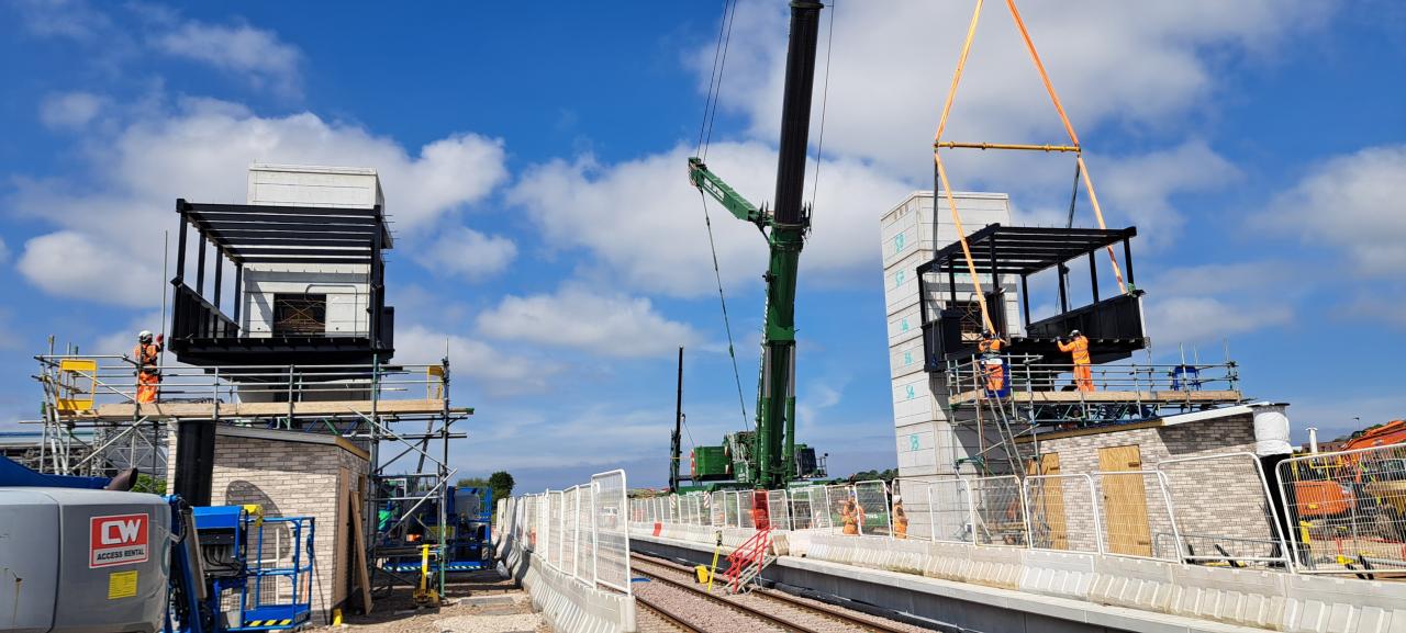 Teams installing the footbridge