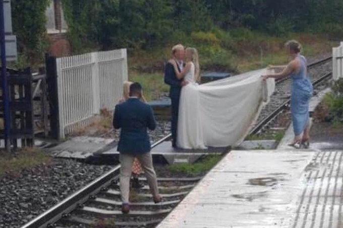 A wedding trespassing on the railway 