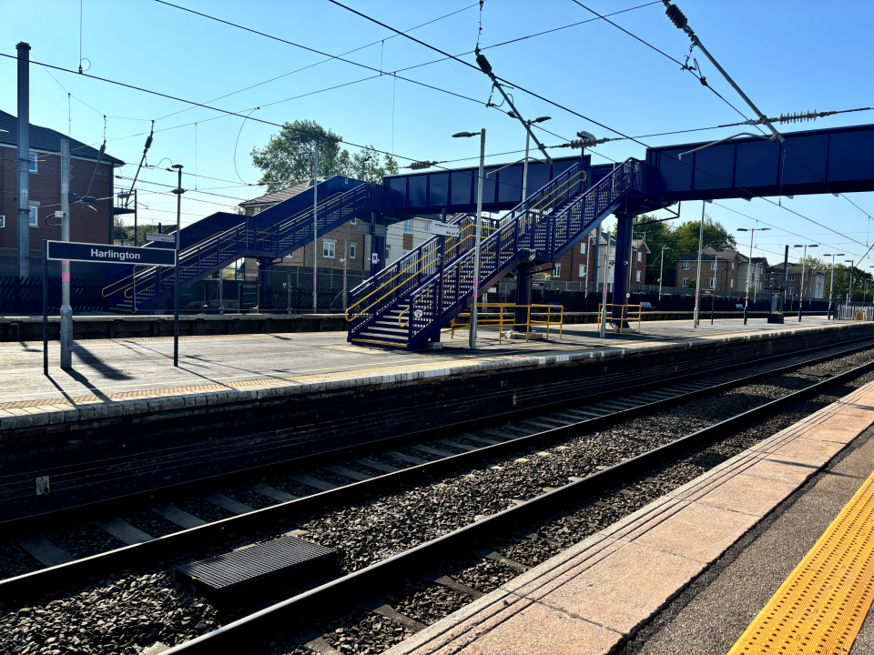 Wide shot of bridge and sign