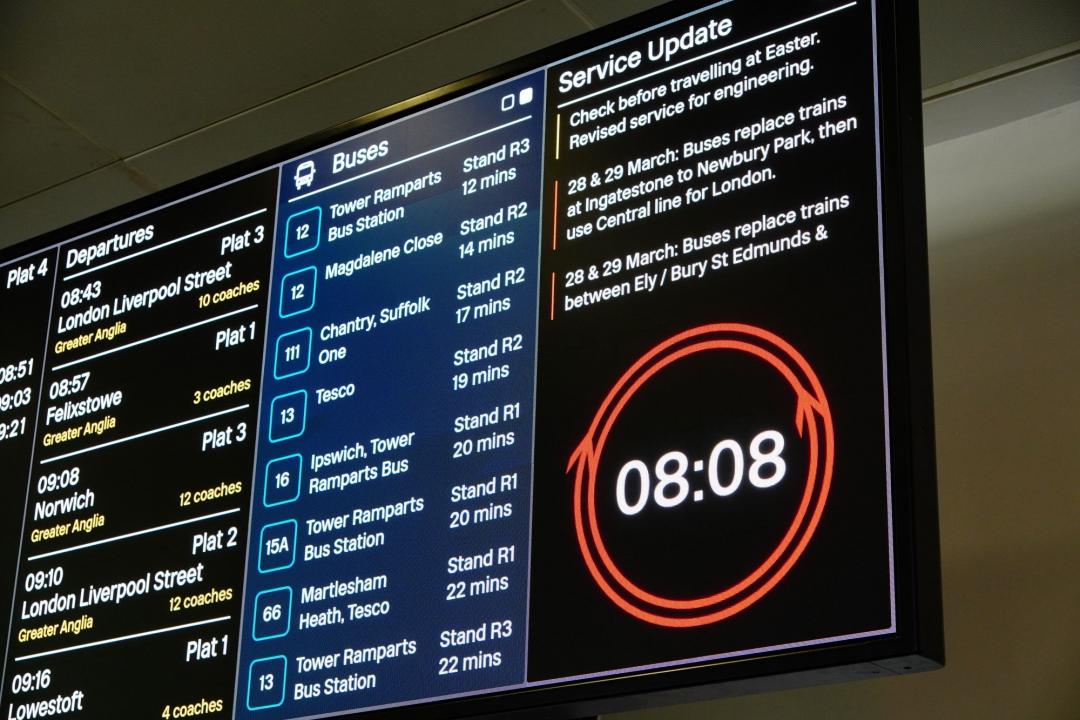 Station clock and board at Ipswich