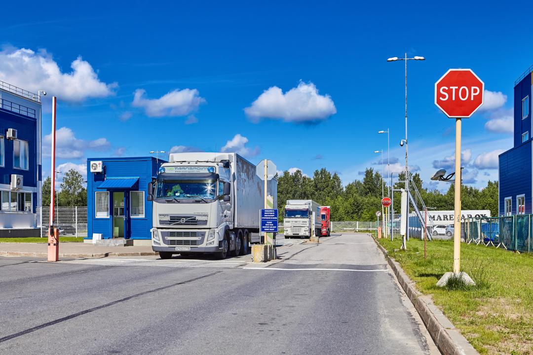 HGV leaving factory gates