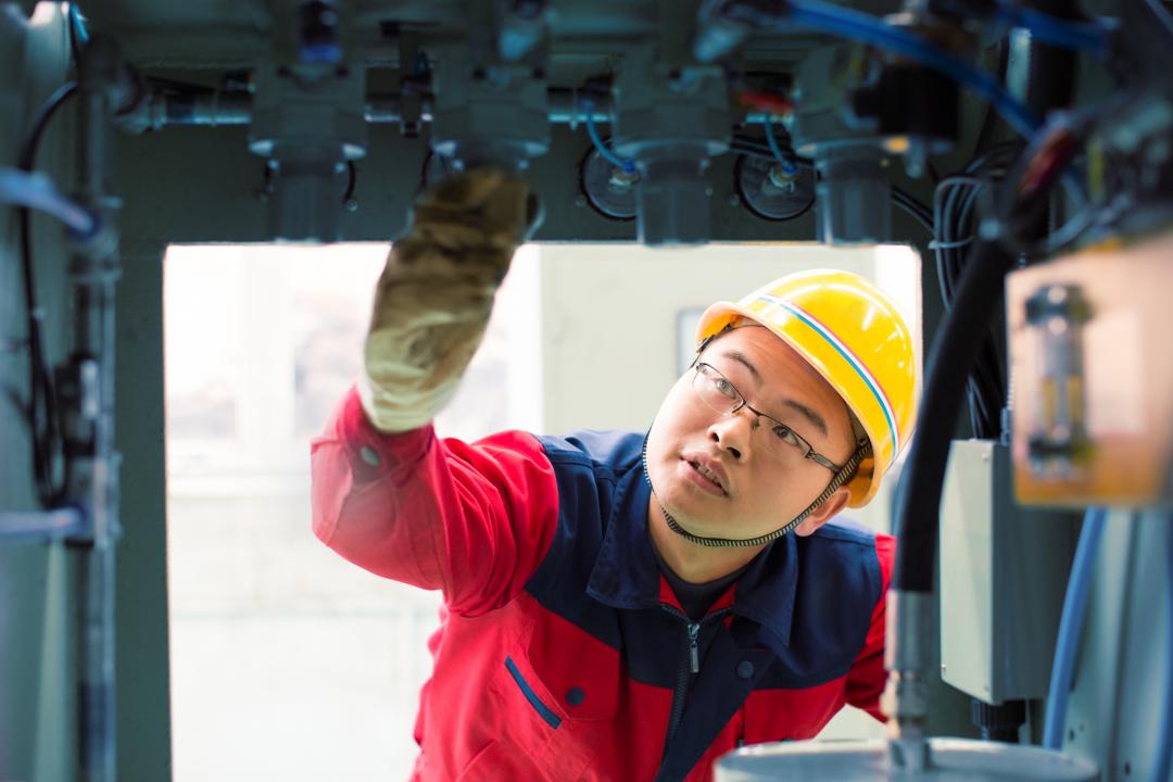 Engineer fixing some electronics