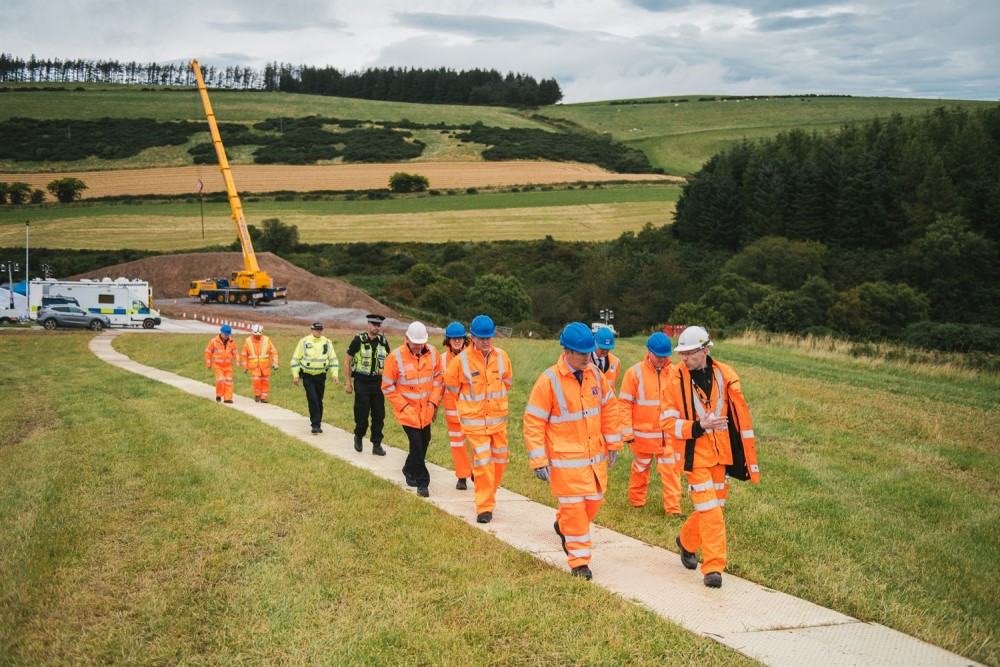 Workers approaching the site 