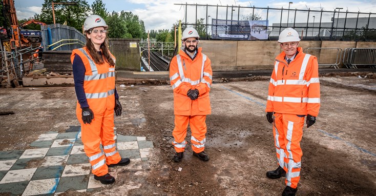 Cllr Brigid Jones, apprentice Haroon Sajad and Mayor Andy Street view the progress on the station site