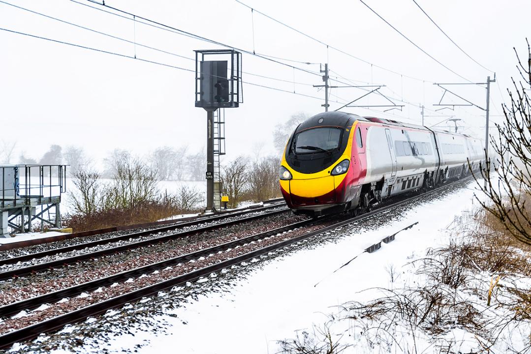 Train operating in snowy conditions in the UK