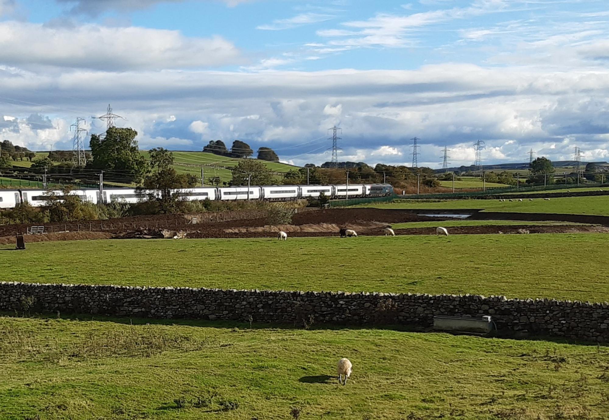 Restored River Leith beside West Coast main line in Thrimby