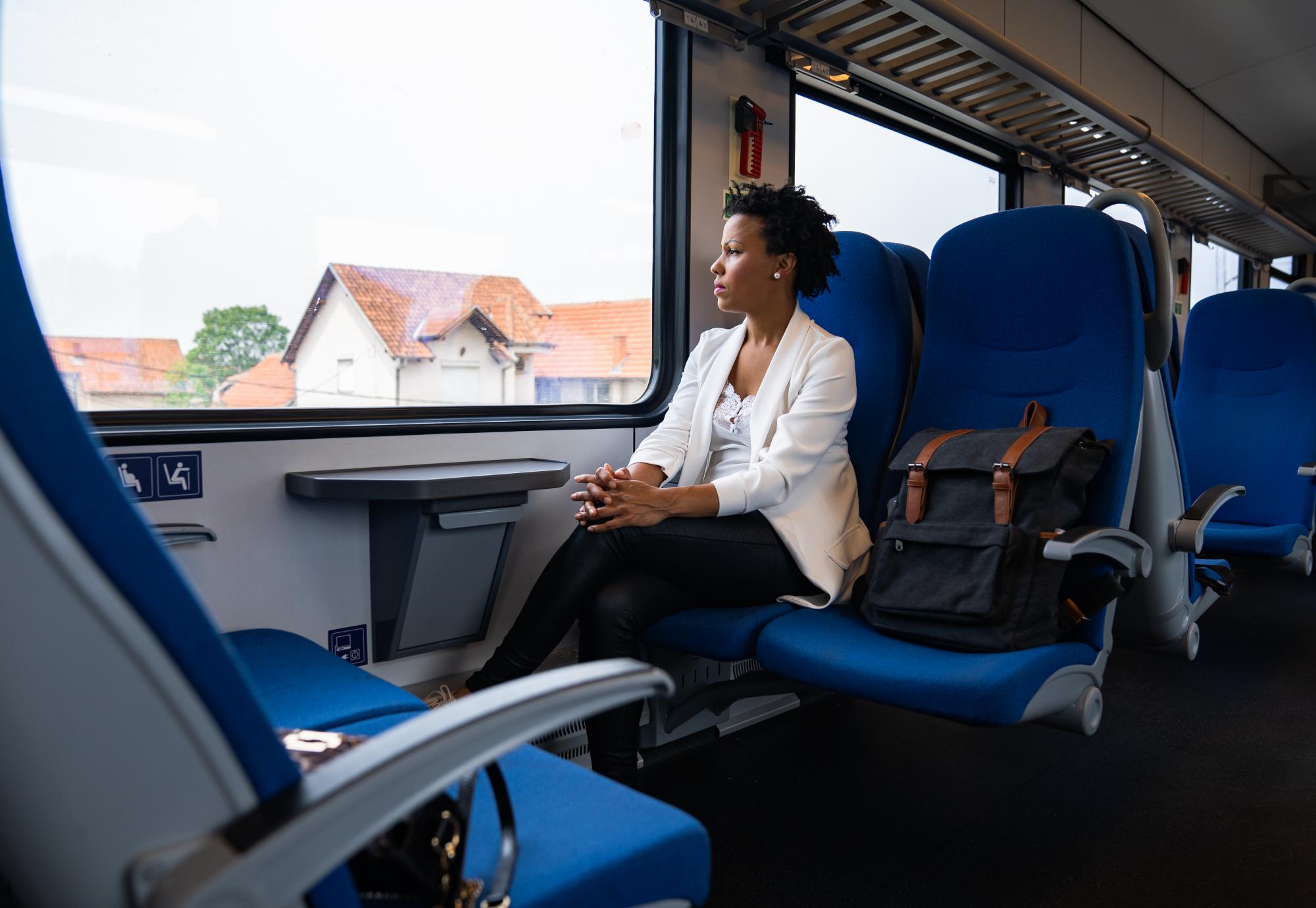 Lady sat on a train 