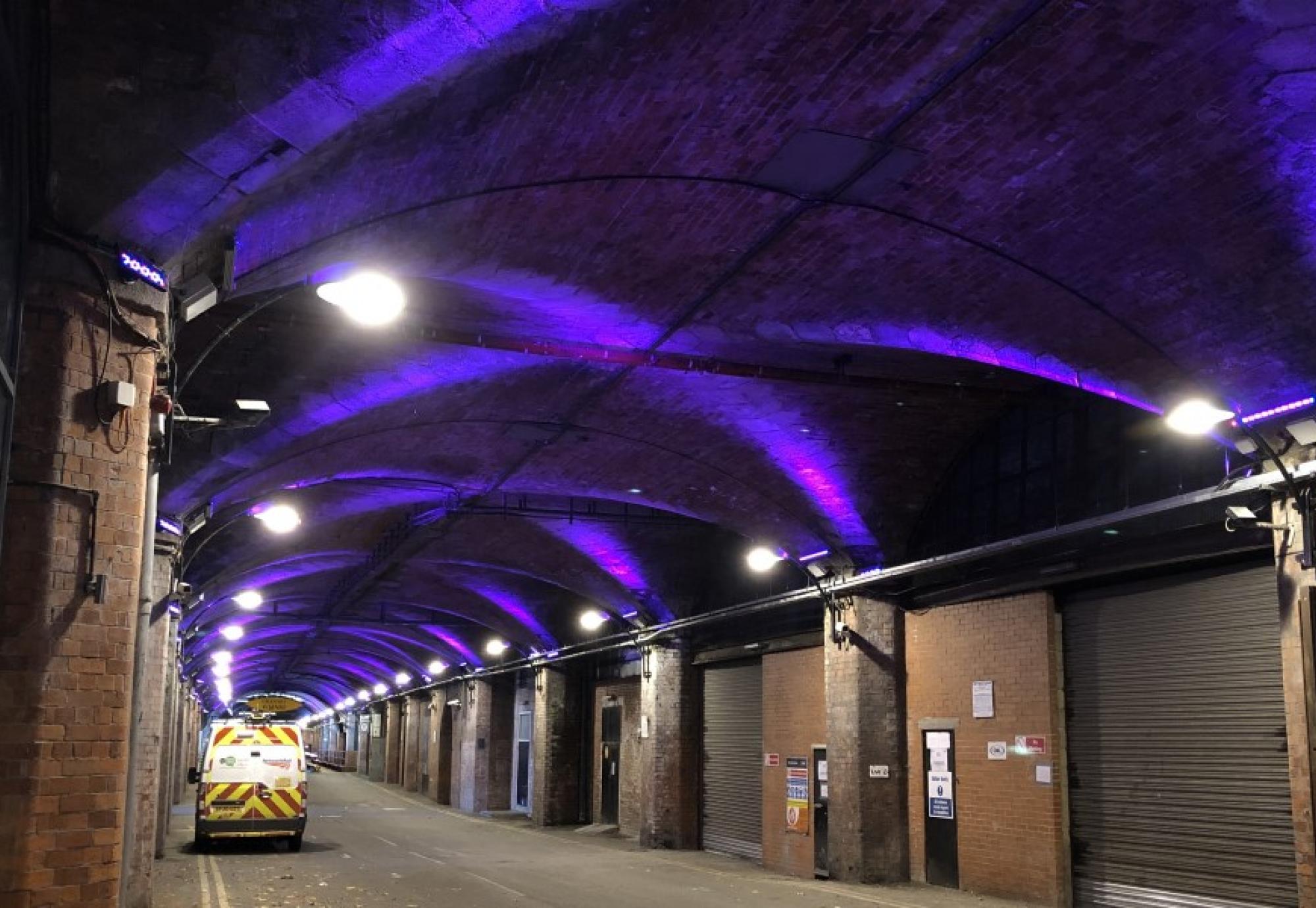 Station with purple lights on the wall 