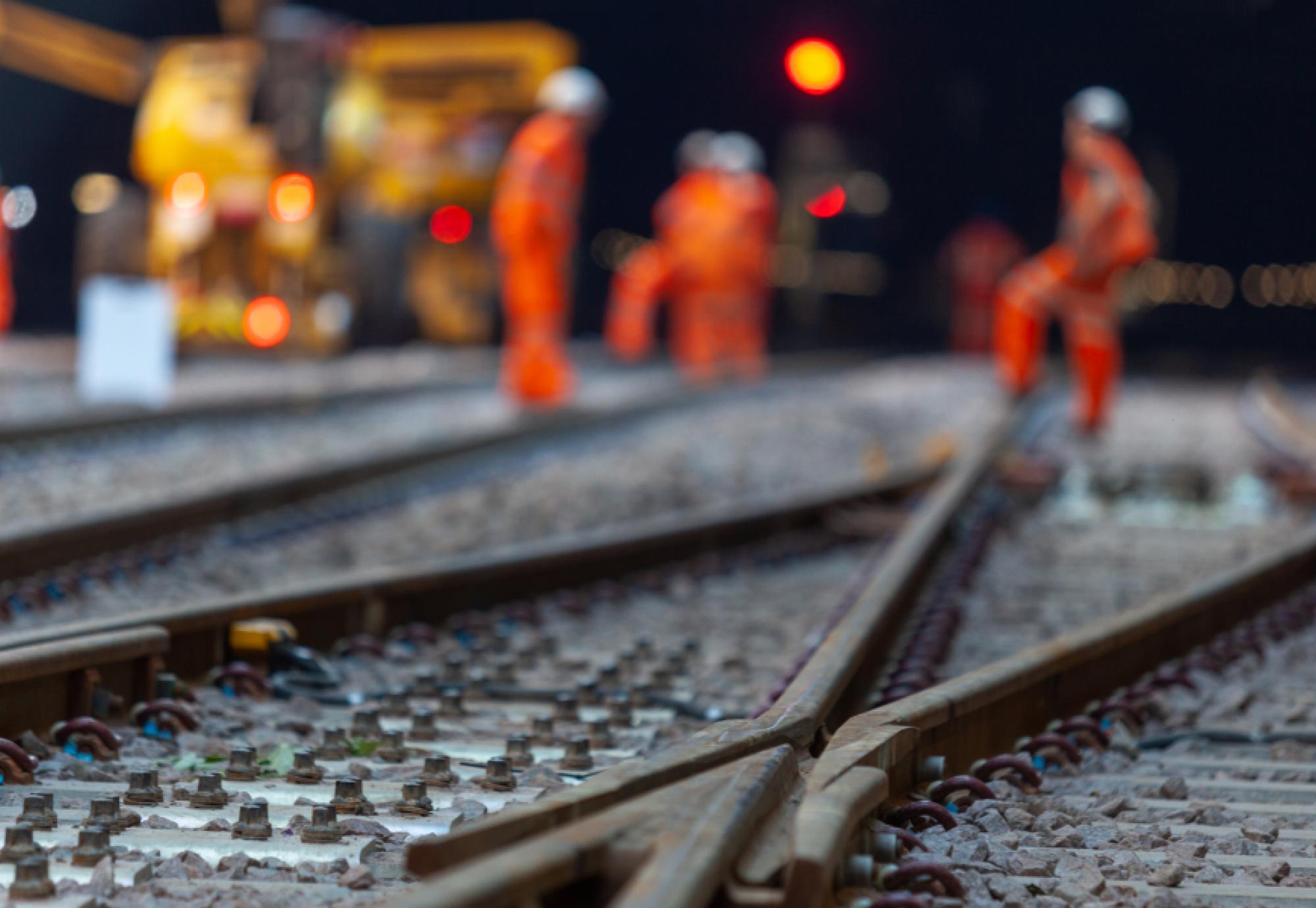 workers on railway track 