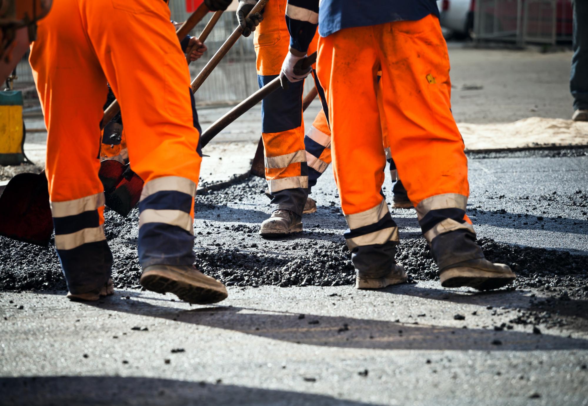 Generic picture of transport workers in high visibility clothing