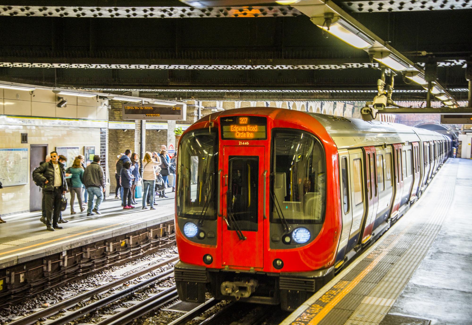 London Underground train arriving at a station