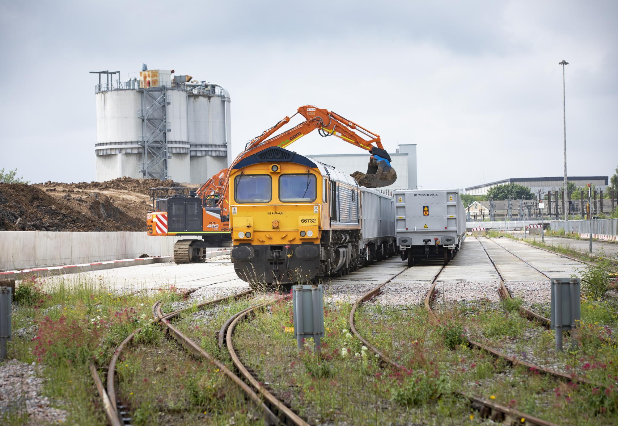 Freight train leaving HS2 Logistics Hub in Willesden