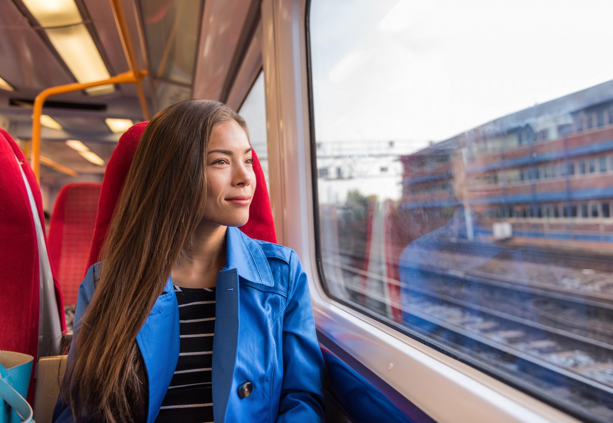 Female passenger riding on a train