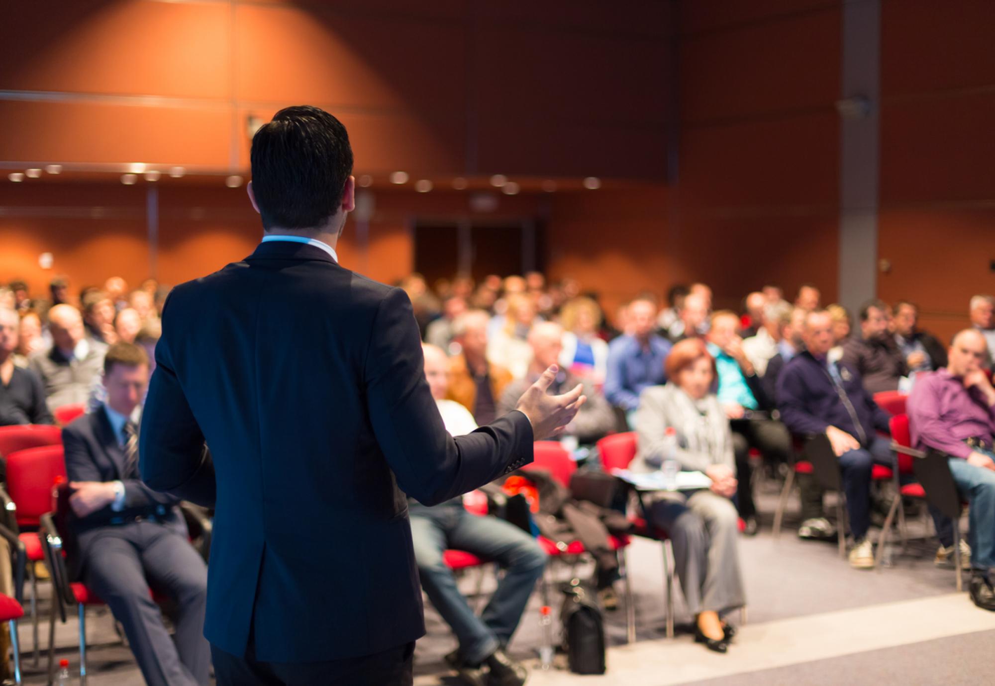 People attend business conference