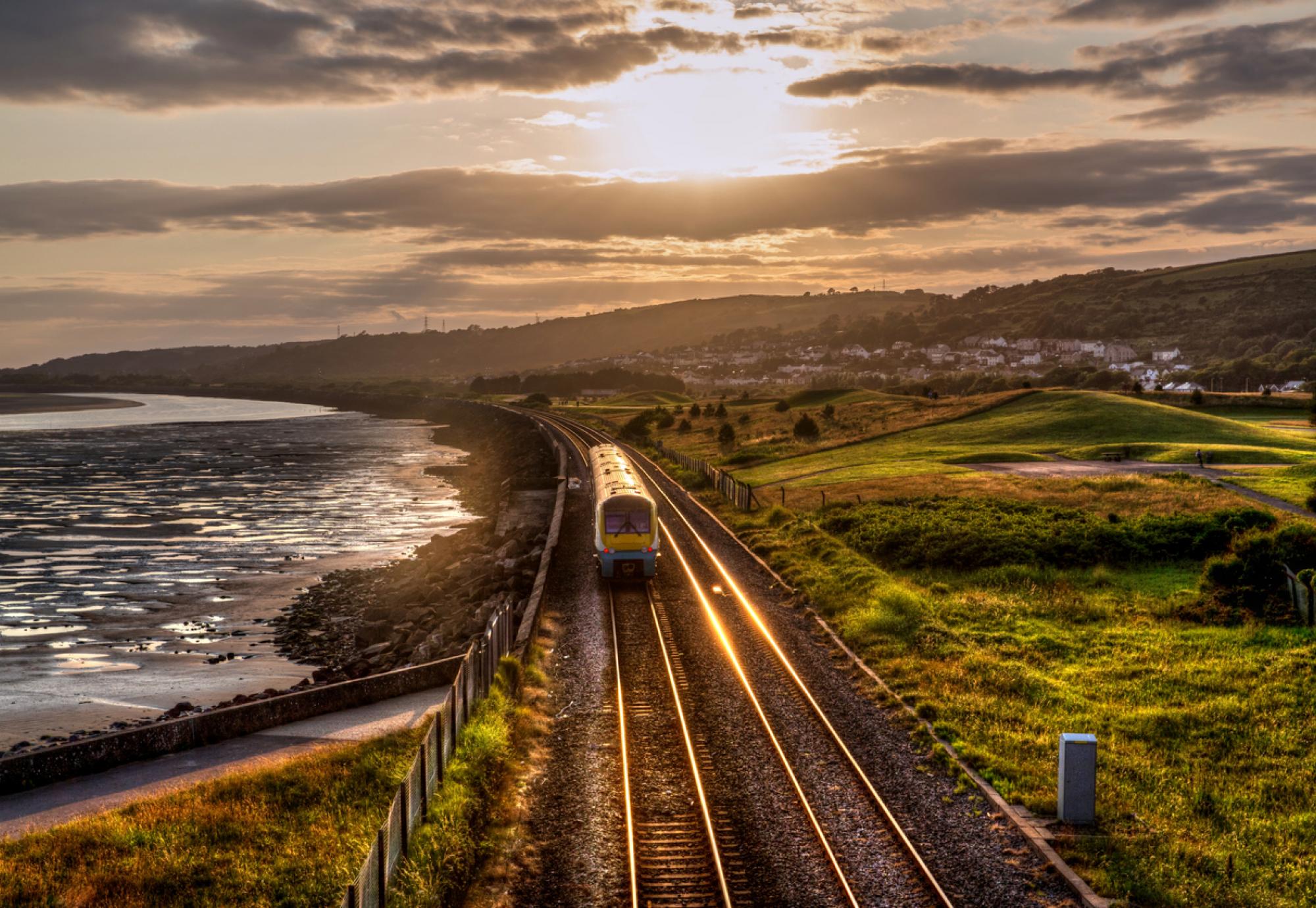 Train travels down tracks