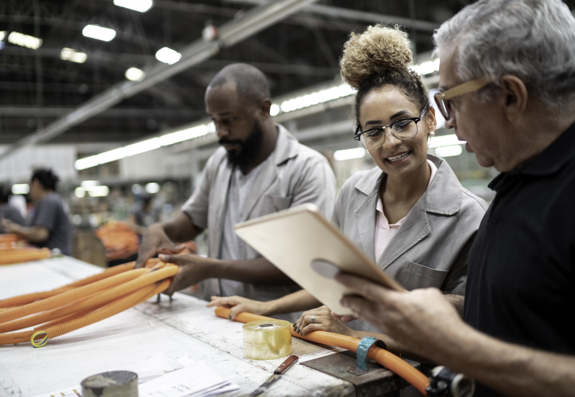 Young woman on a manufacturing apprenticeship