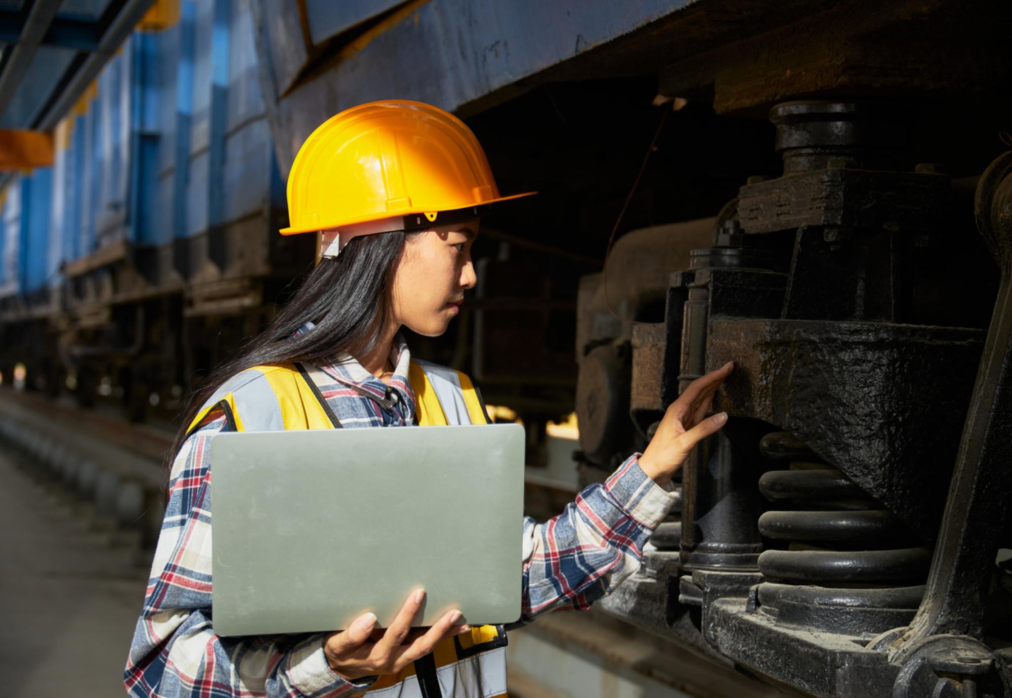 Female engineer working on train