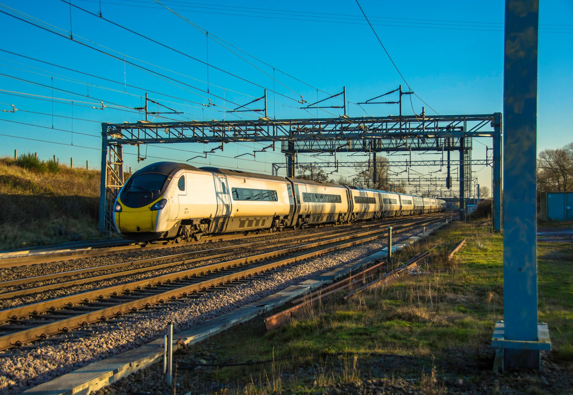 Train travels down tracks