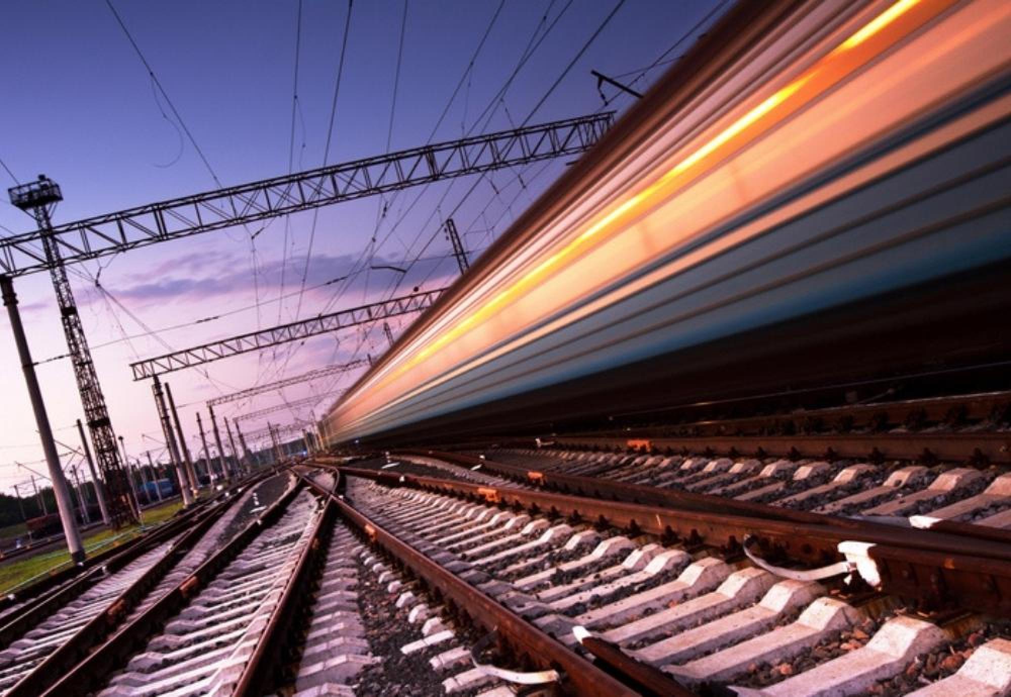 Train travels down tracks