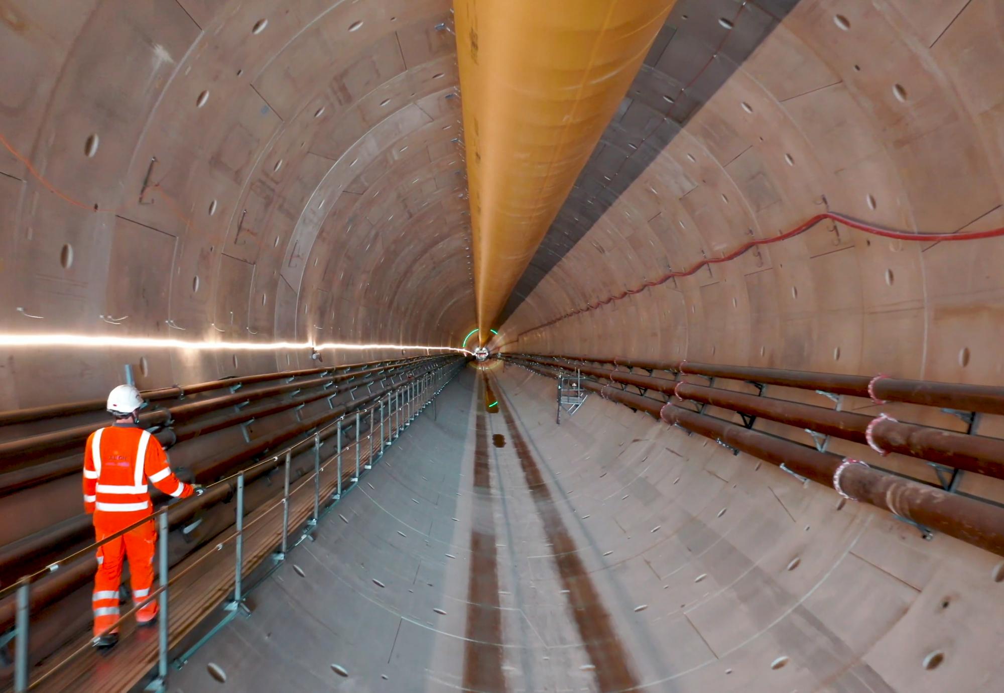 Worker walking down the Chiltern tunnel