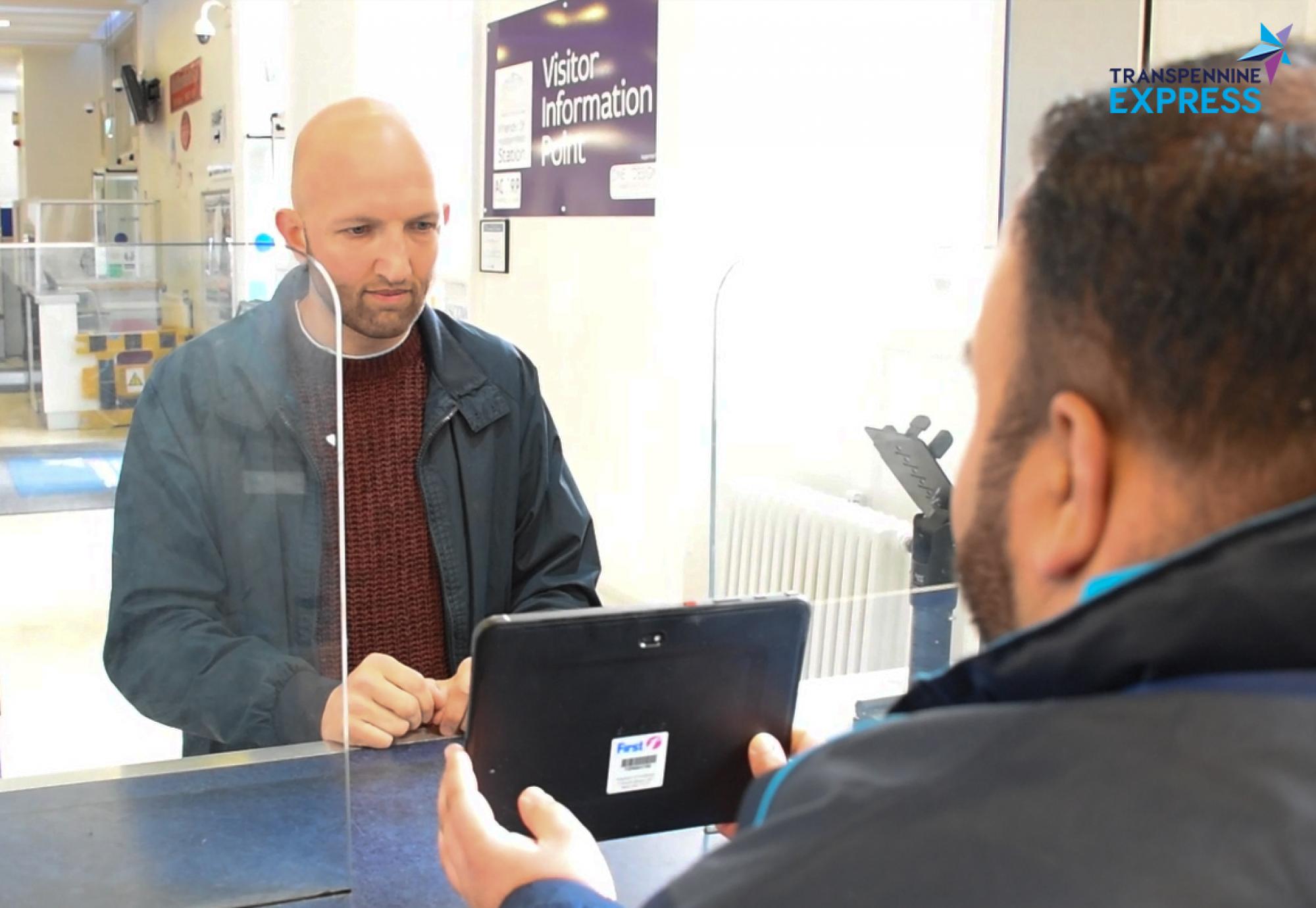 Passenger using the new TransPennine Express sign language service