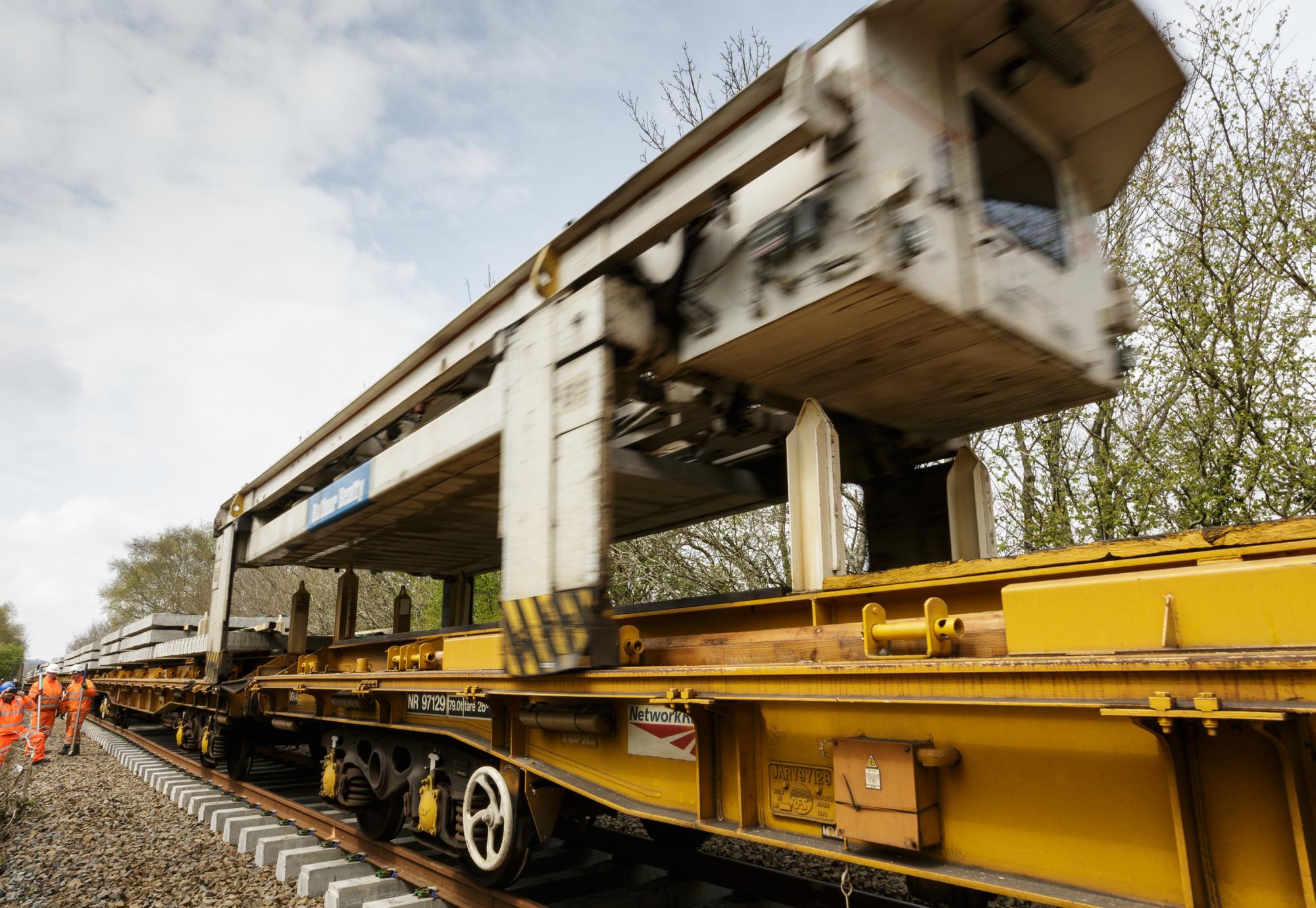 The NTC (new track construction) machine in action on the Dartmoor Line, via Network Rail 