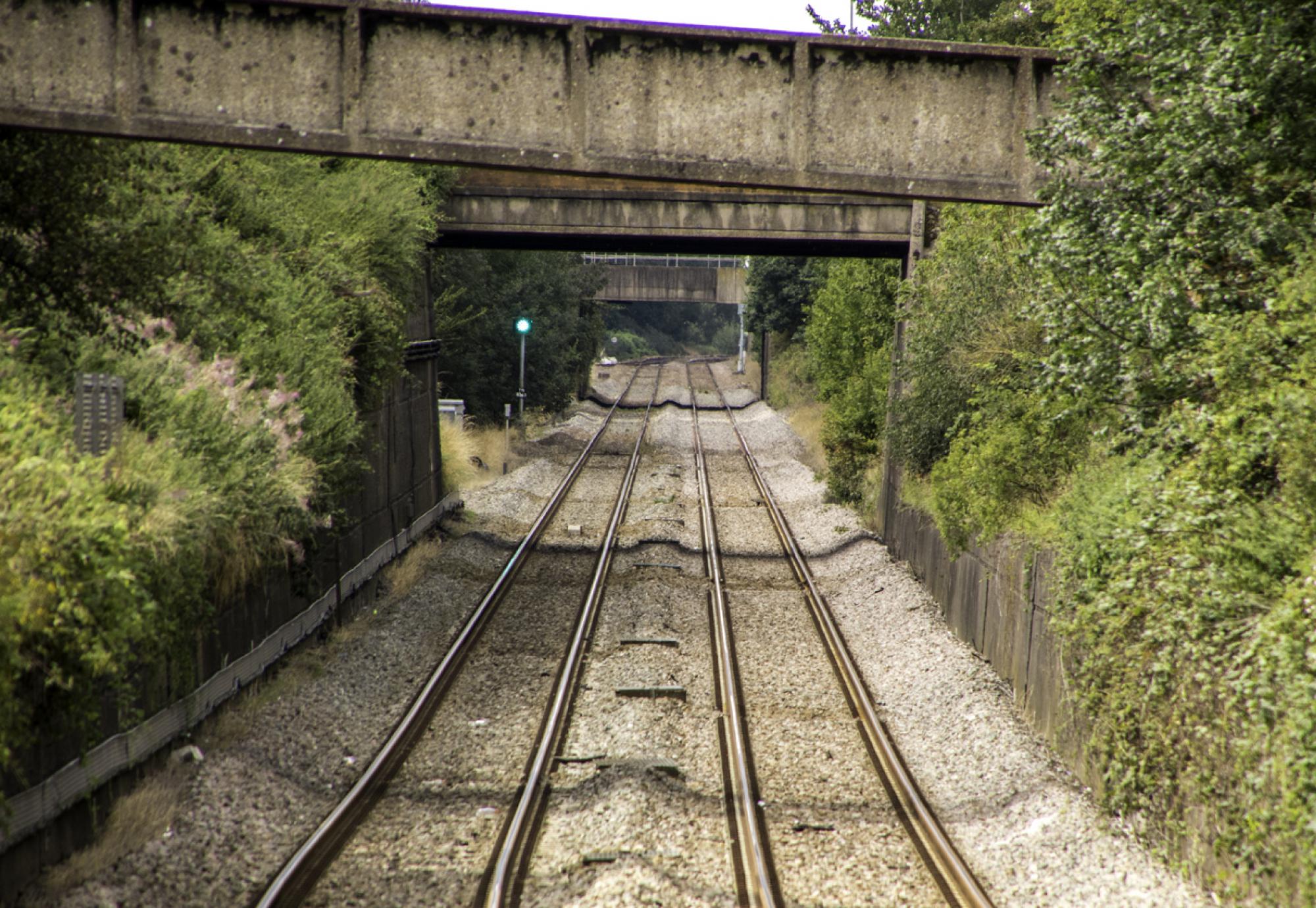 Dry rail track on a hot day, via Istock