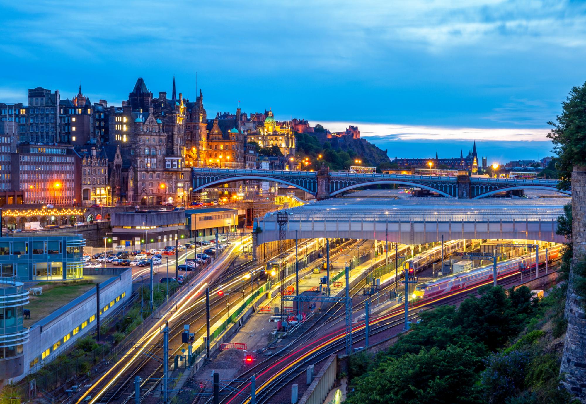 Night view of waverley station in edinburgh, scotland, via Istock 