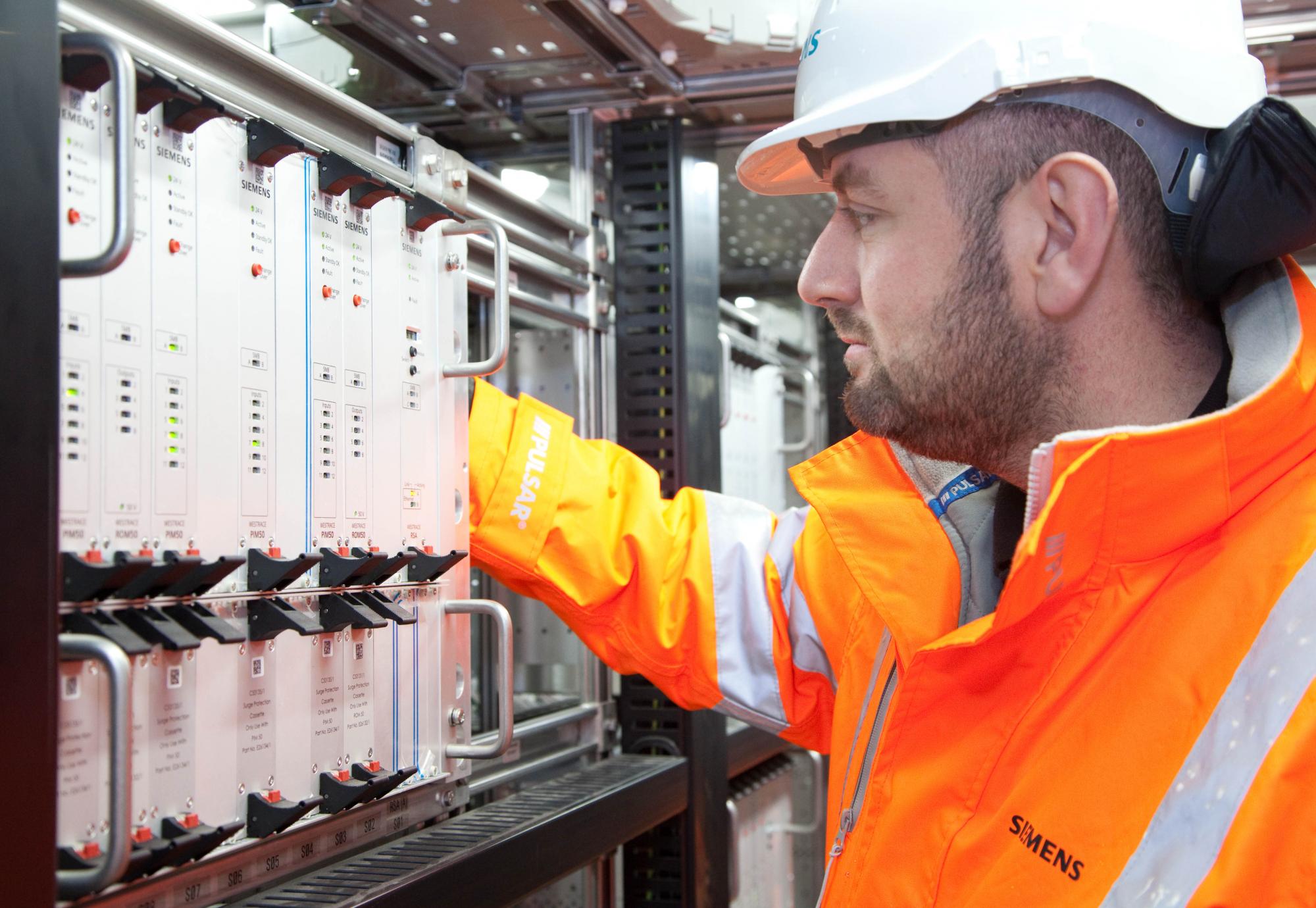 Engineer testing new signalling equipment, via Network Rail 