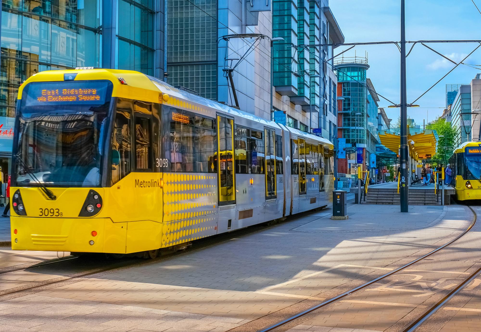 Light rail Metrolink tram in the city center of Manchester, UK. Via Istock 