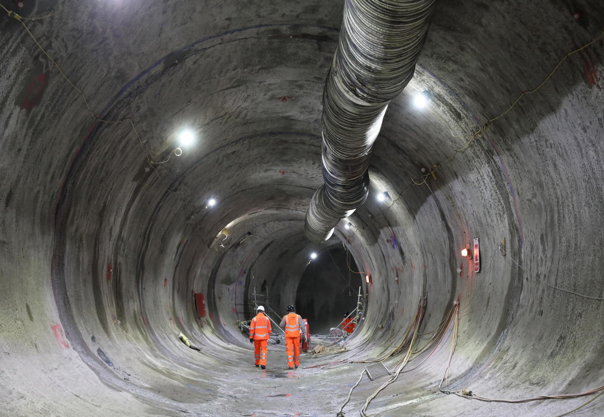 Engineers walking through the traction substation tunnel beneath HS2's Euston Station, via HS2 