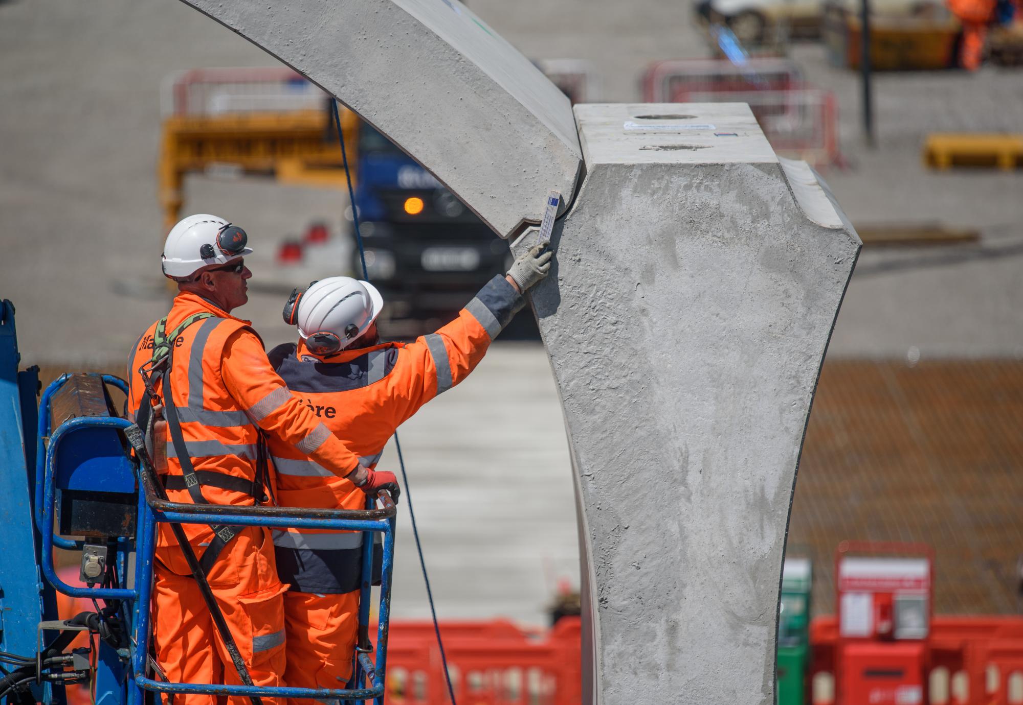 Workers inspect part of HS2