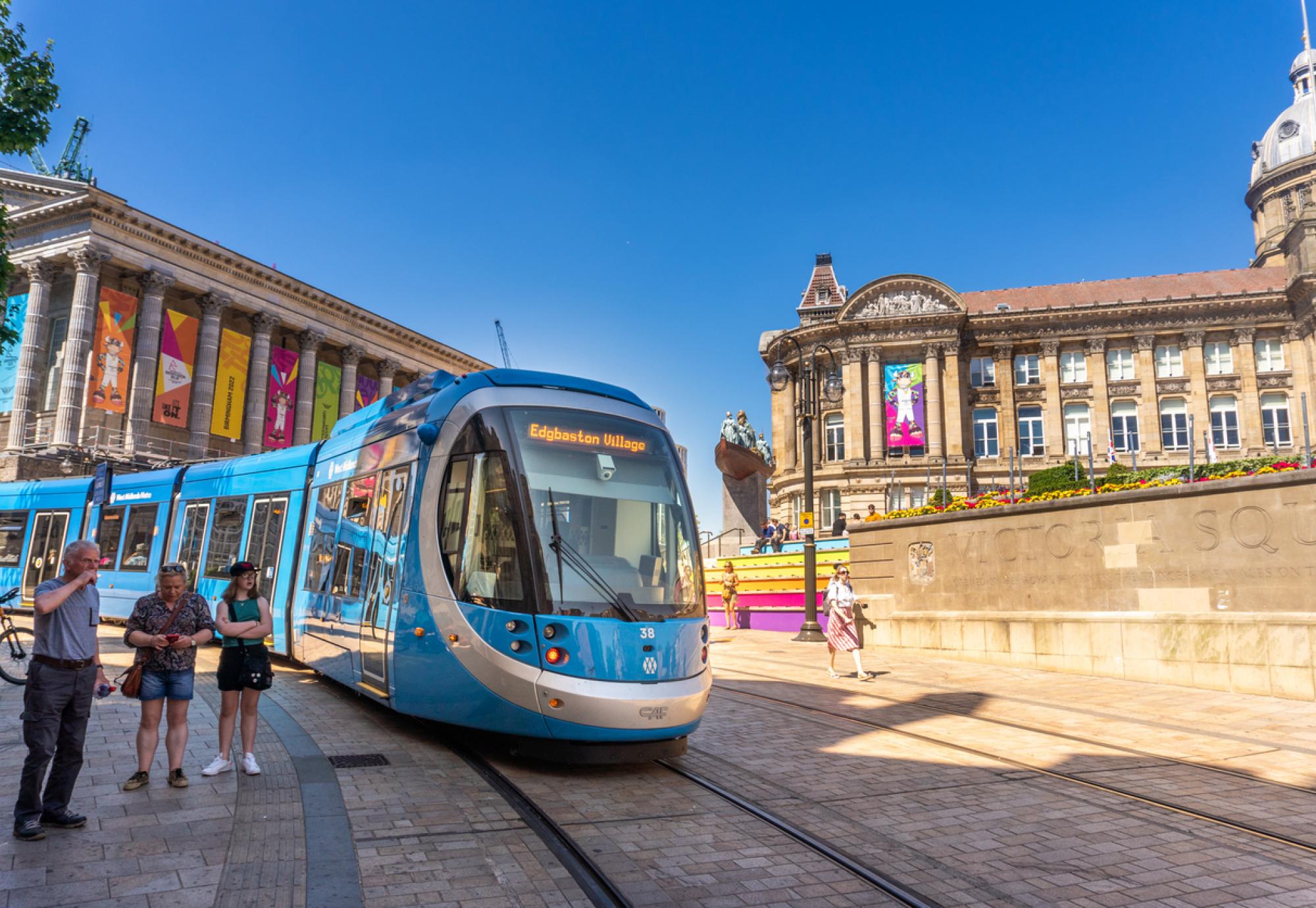 Image of Birmingham tram with City Hall in the background