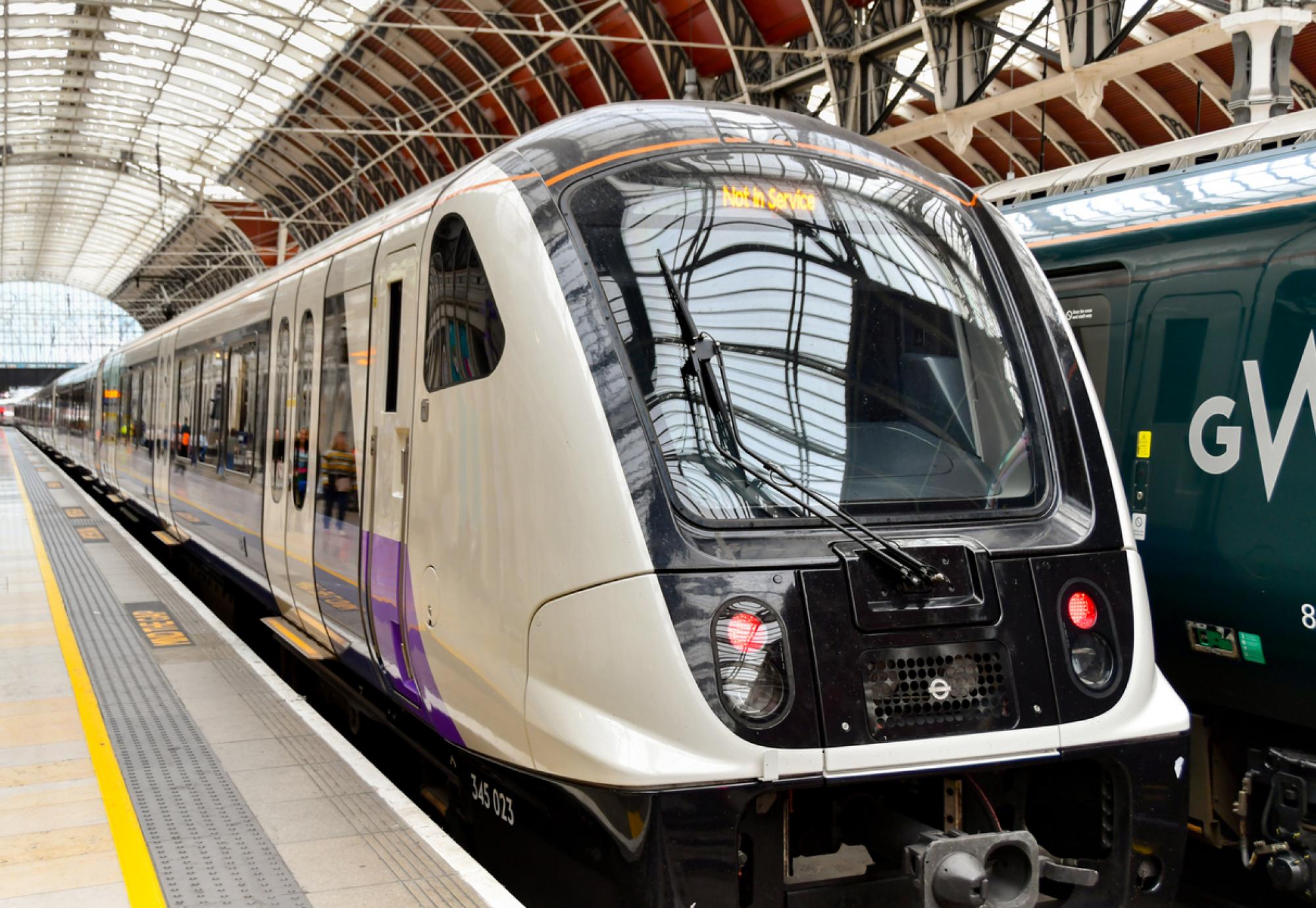 New commuter train on the Elizabeth Line stopped at London Paddington railway station
