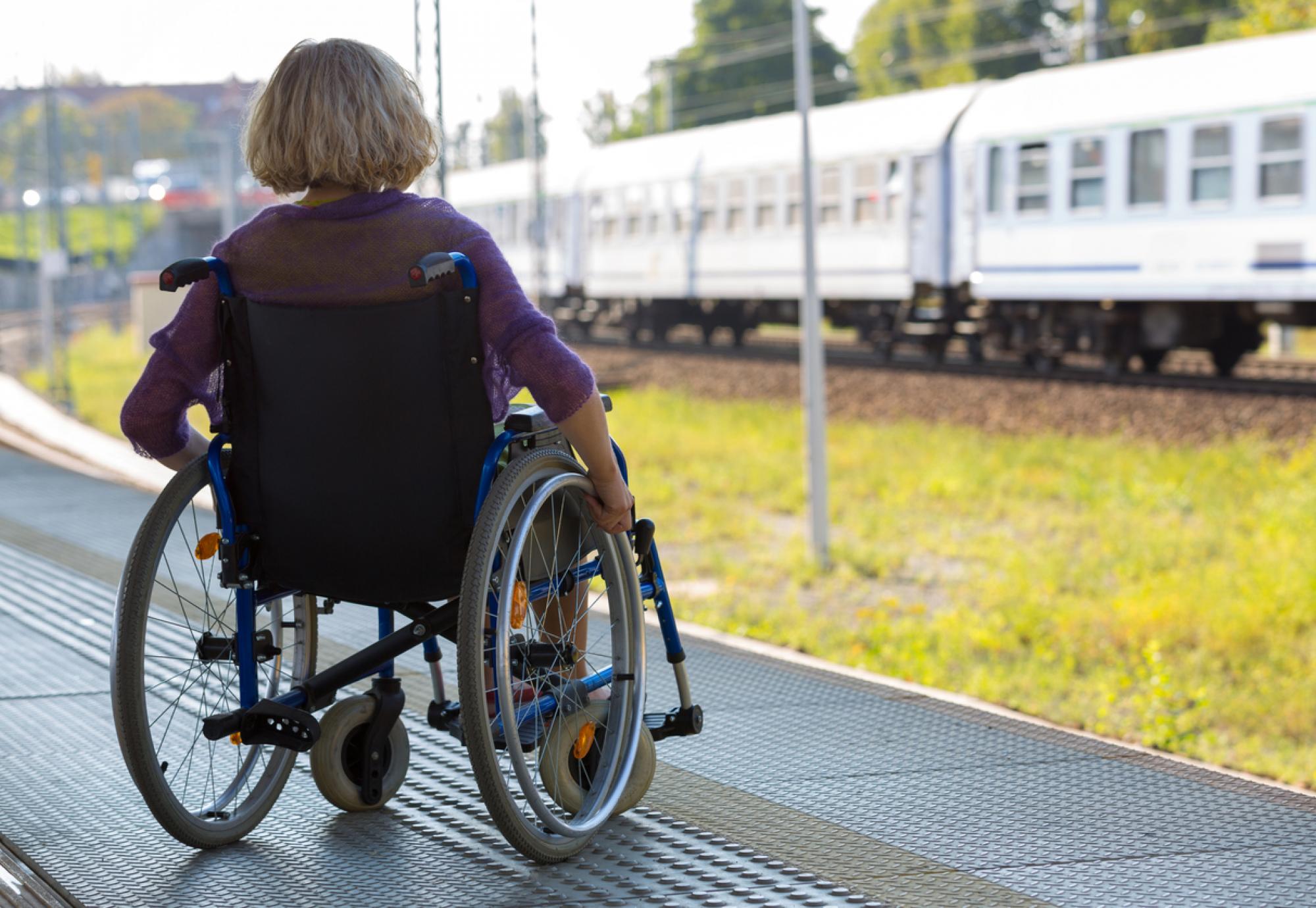 Female rail user in wheelchair