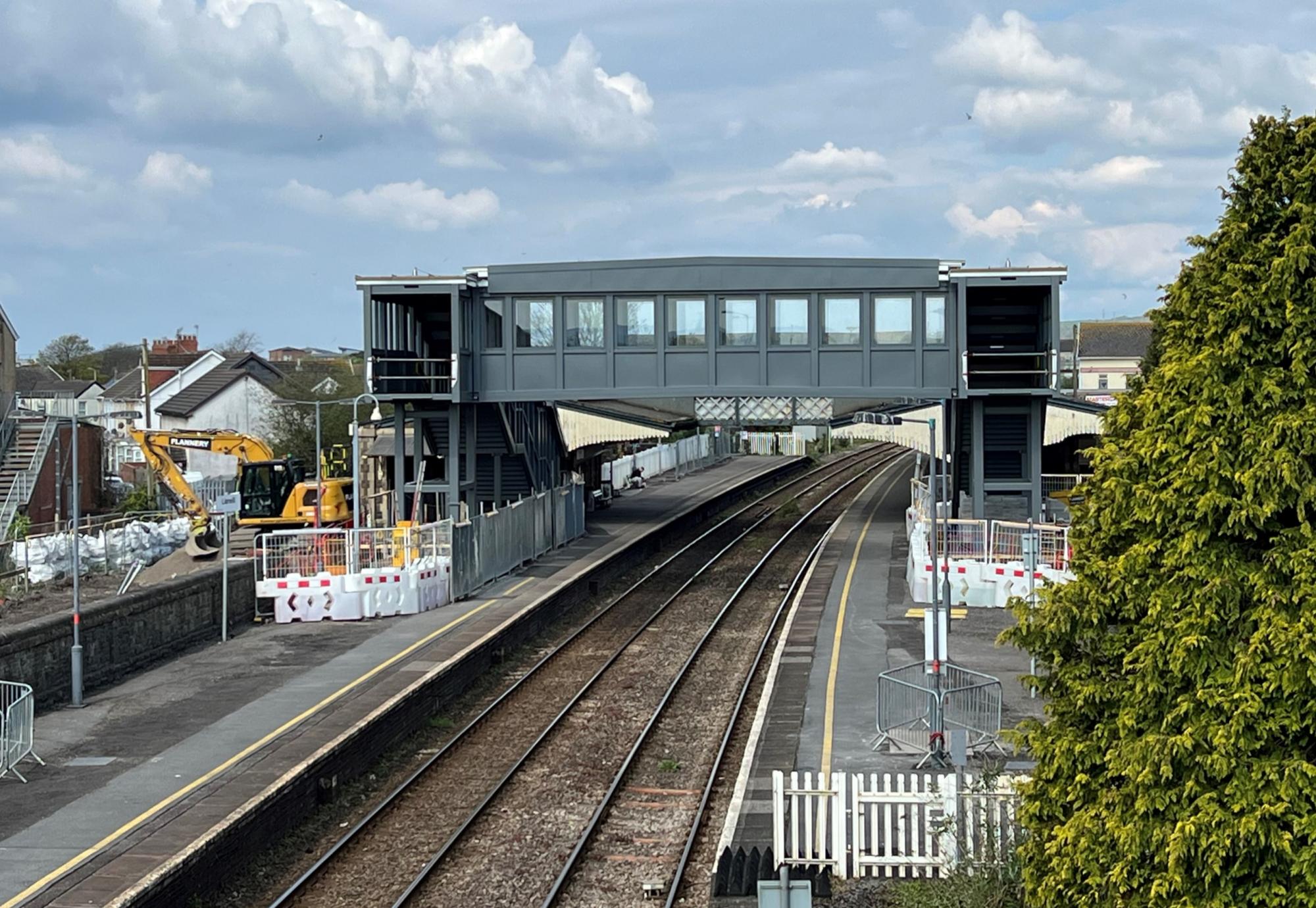 Bridge span is installed at Llanelli station as part of construction of accessible footbridge