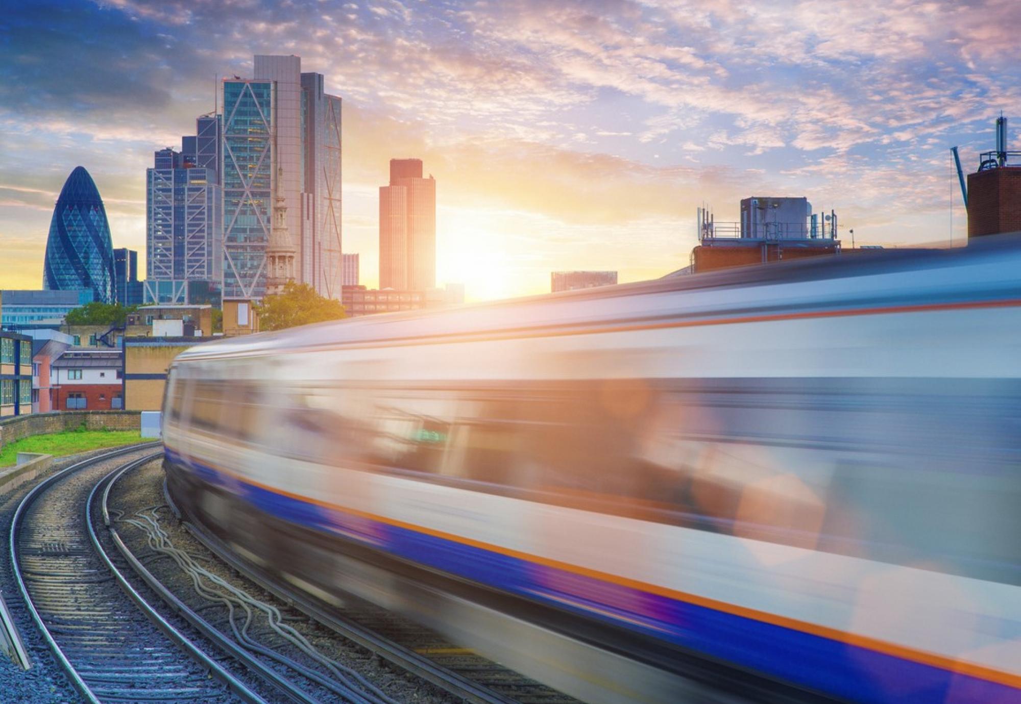 Overground Train approaching London skyline